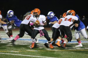Hezekiah Patterson hands off against Hightstown.  Photo by Donna "Roll Tide" Brihn.