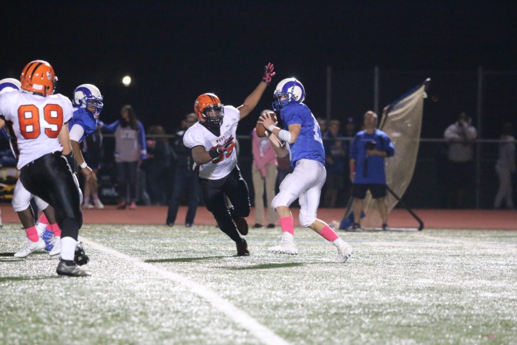 Rahmel Turner puts the pressure on Hightstown's quarterback.  Photo by Donna "Roll Tide" Brihn.
