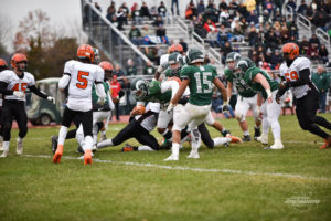 Jordan Morrison pushes his way to the end-zone for a touchdown in the 58th Annual Thanksgiving Day Game against Hamilton West. Photo by Michael A. Sabo