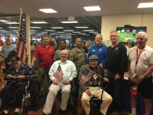 Past and Present Veterans at the Hamilton Area YMCA Veteran's Day Celebration. Photo courtesy of the Hamilton Area YMCA.